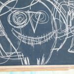 Visage dessiné au tableau